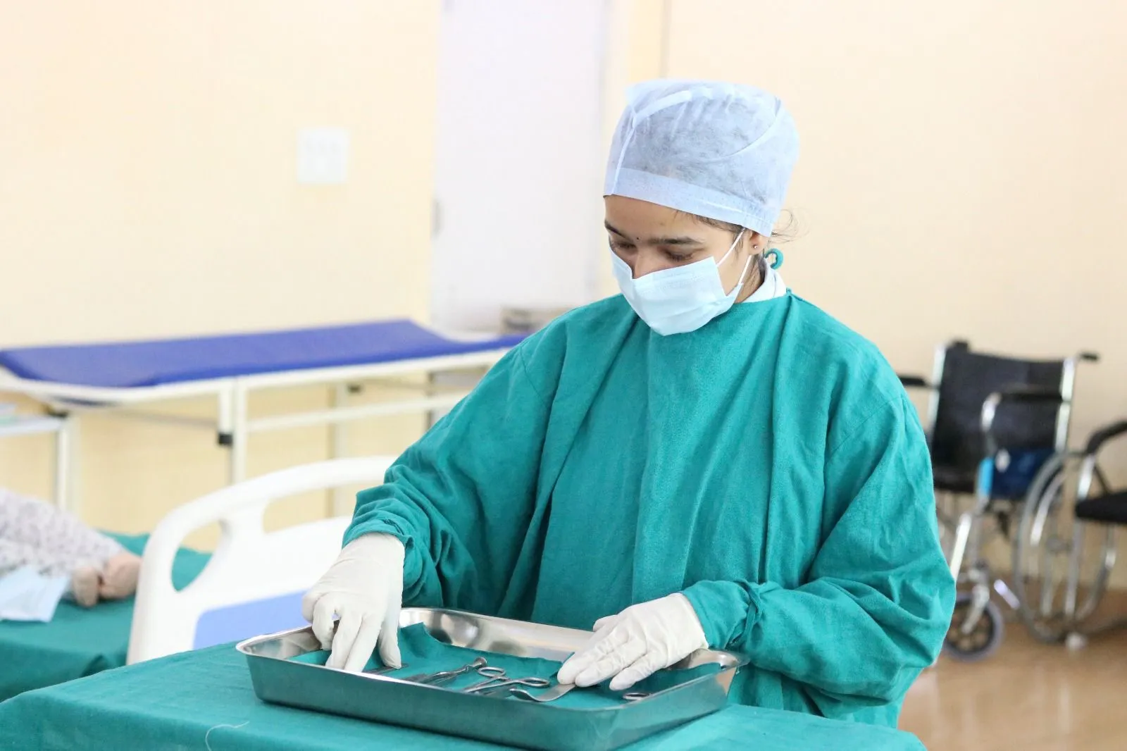 B.Sc OTT student preparing surgical instruments